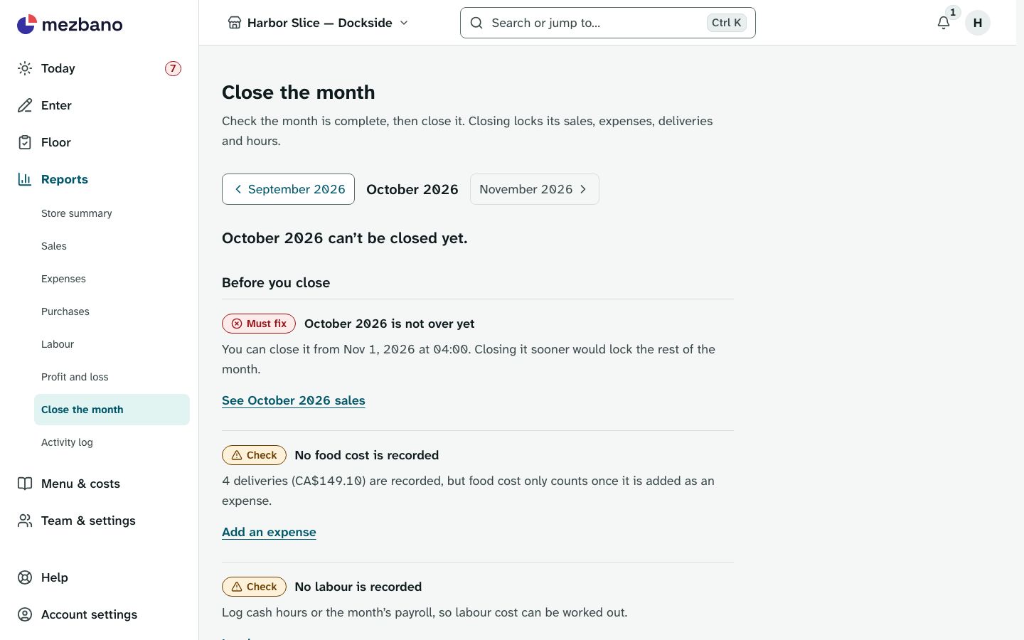The Close the month page on a desktop, listing what to check before closing October: a must-fix item that the month is not over yet, and checks for missing food cost and labour.
